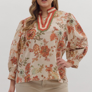 Floral print ¾ sleeve top featuring scallop accent trim V-neck