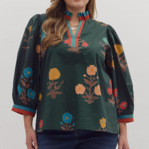 Floral print 3/4 puff sleeve top featuring contrast trim split neck and cuffs